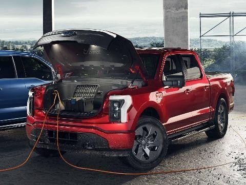 Red EV Ford truck